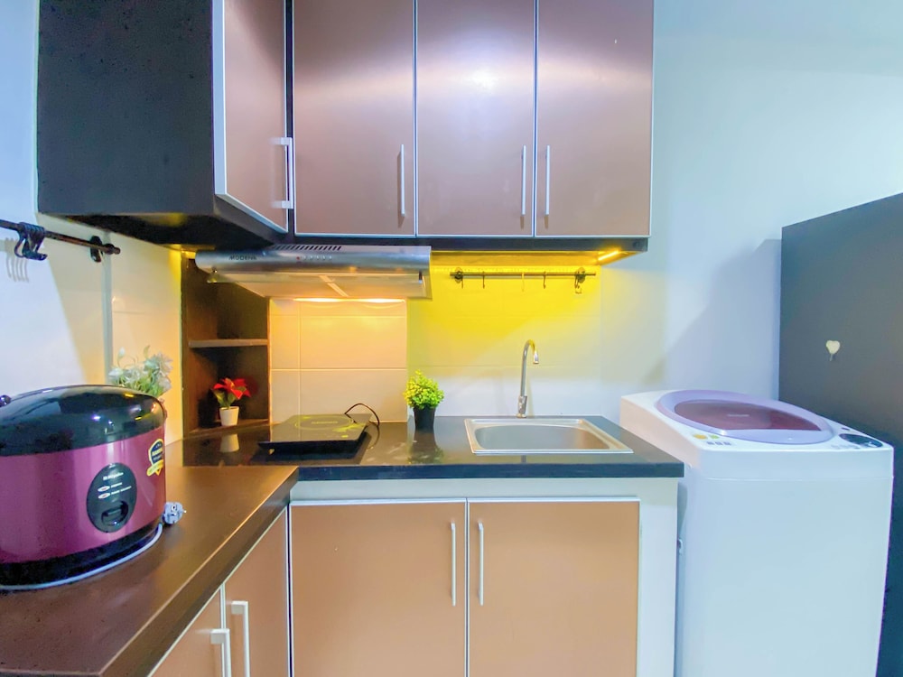 Simple 2Br At Azalea Suites Apartment