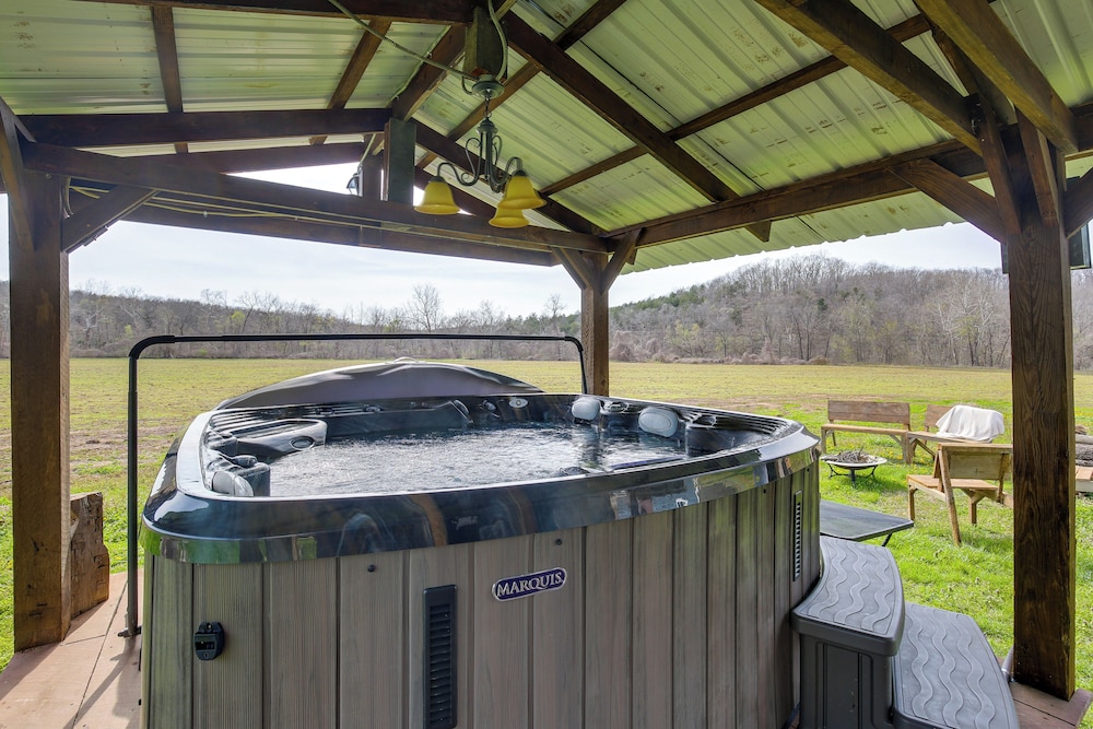 Hot Tub & Creek Views: Secluded Perryville Cabin