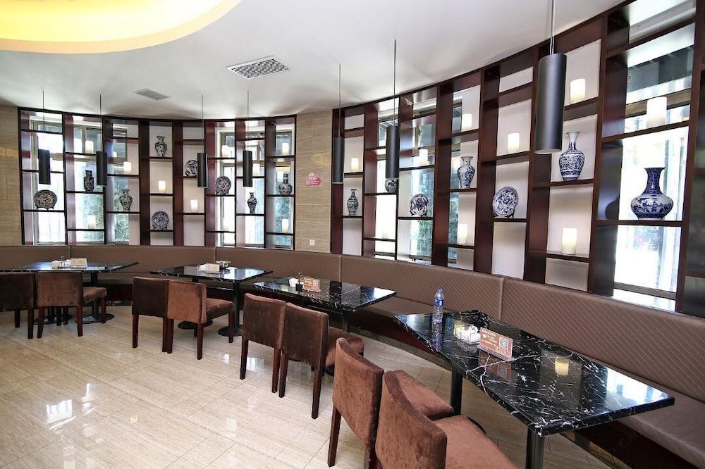 Baolong Homelike Hotel Changxing Branch