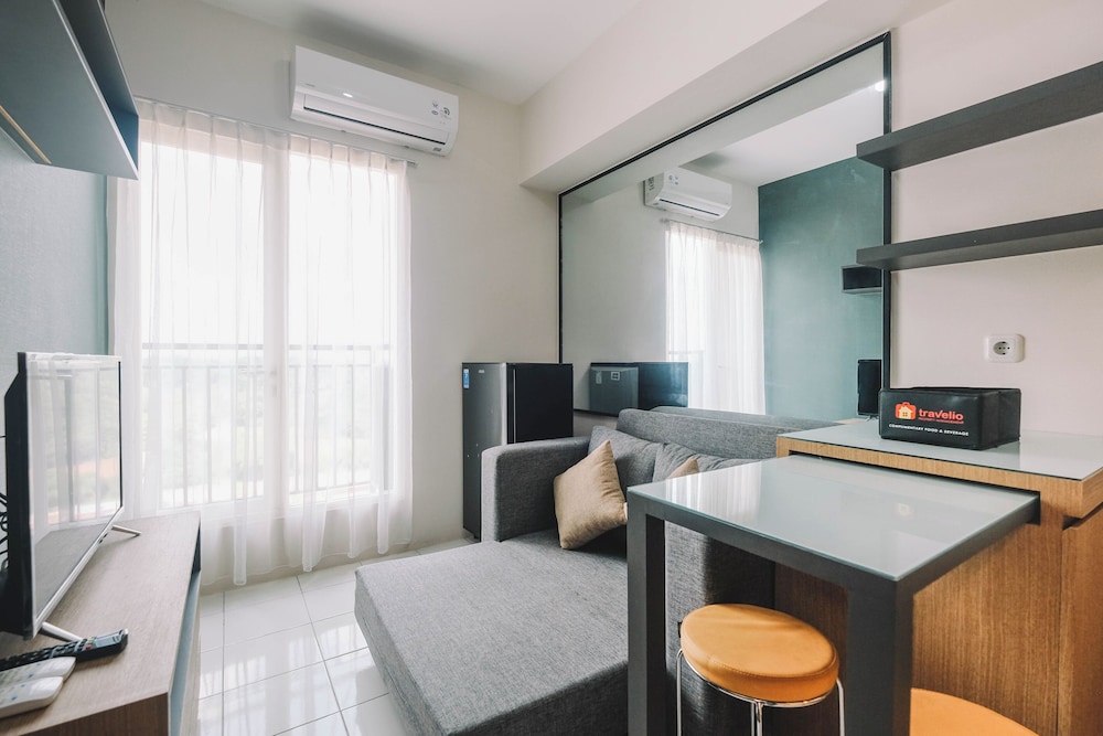 Simple and Cozy Living 2BR at Podomoro Golf View Apartment