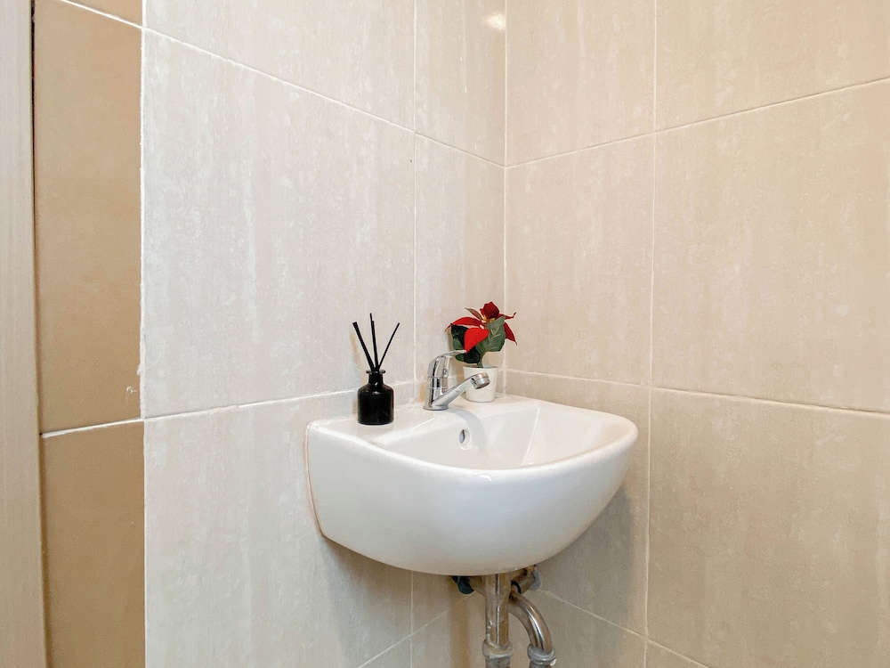 Warm Minimalist Studio Apartment Near Paramadina University At Meikarta