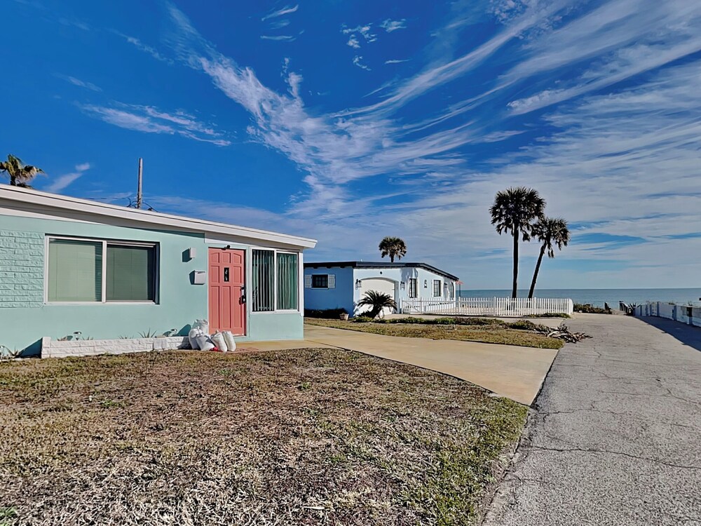 Bathing Suit Beach Bungalow by Distinctive Beach Rentals
