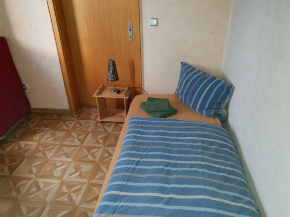 Monteurzimmer Hoffmann en Wirges — bedroom