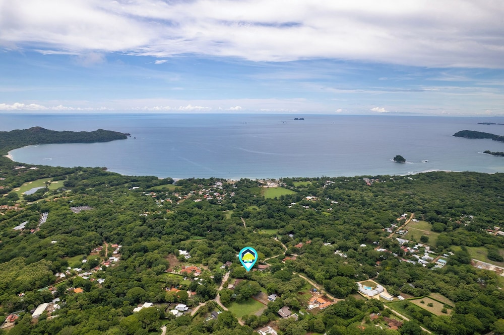 Beautiful home in a gated Neighborhood, Walking Distance to Beach with Garden