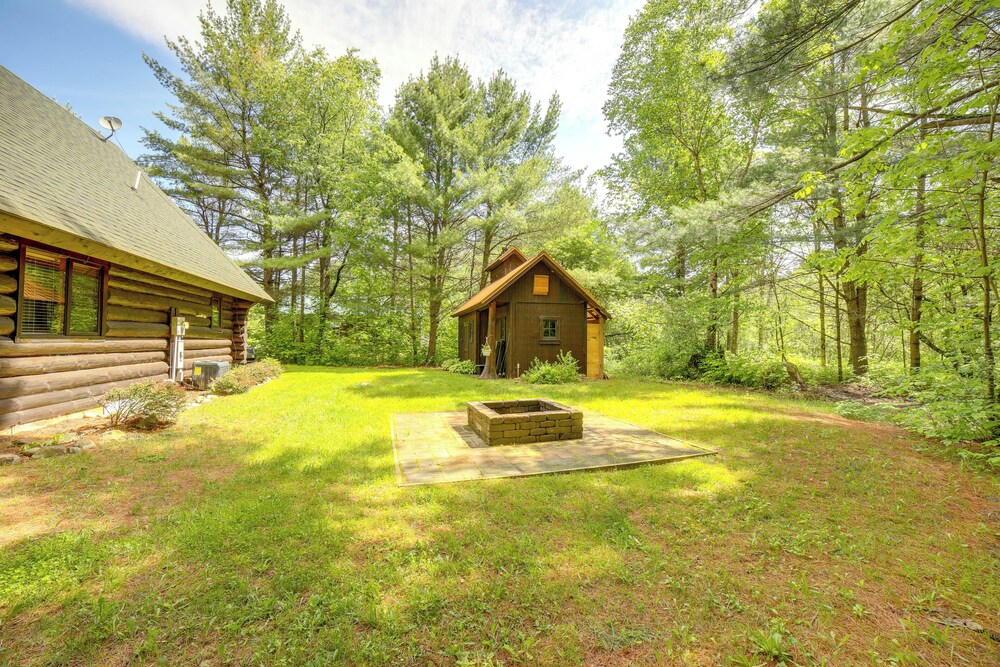 Secluded Log Cabin in NW Michigan: Hot Tub Deck - Property Image 12