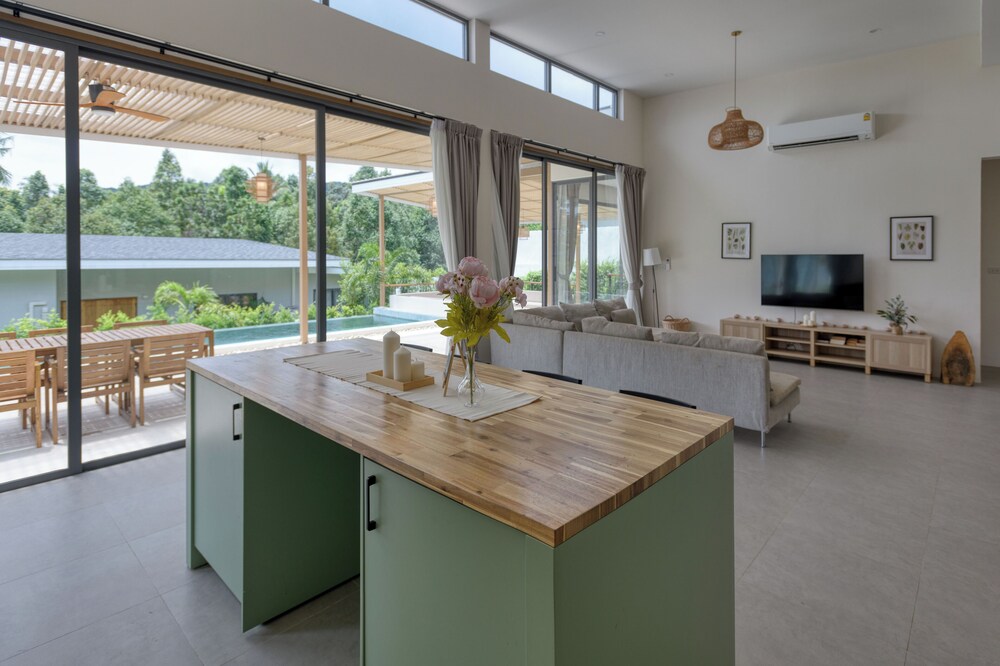 Tropical Poolside Retreat by Sea N' Rent