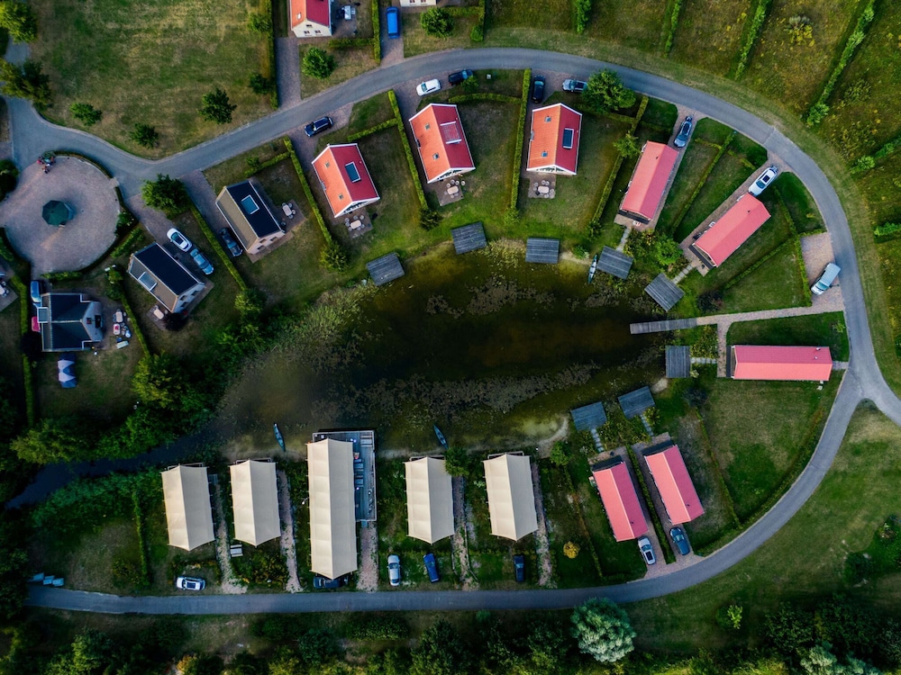 Campsite - Combined Tents With Kitchen and Bathroom Located Near a Pond
