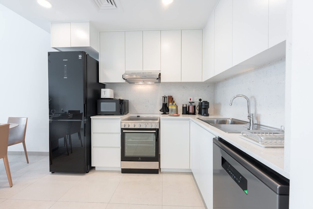 Bright Airy 1BR in Asayel 2 - Fits 4 Comfortably