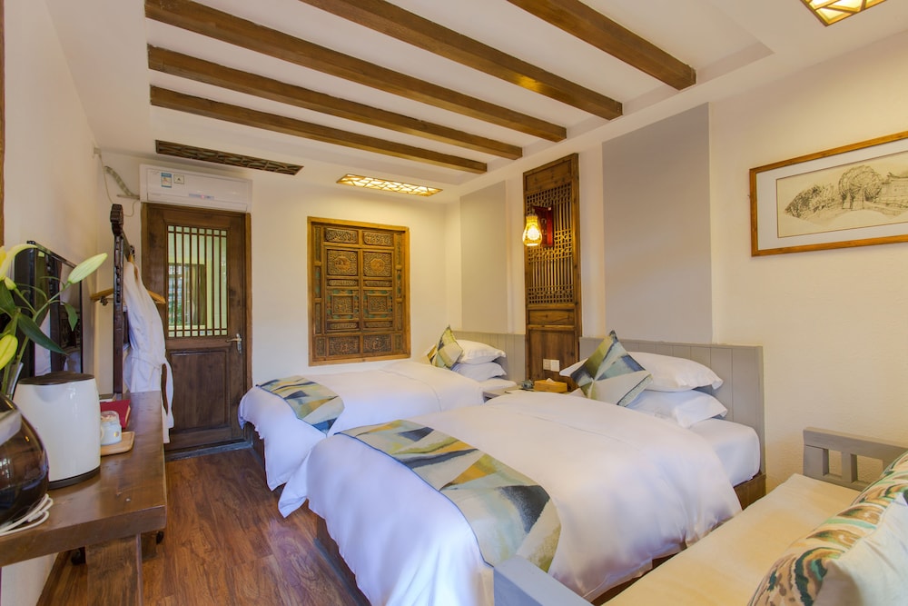 Hua Zhu Fansu Yunju Homestay
