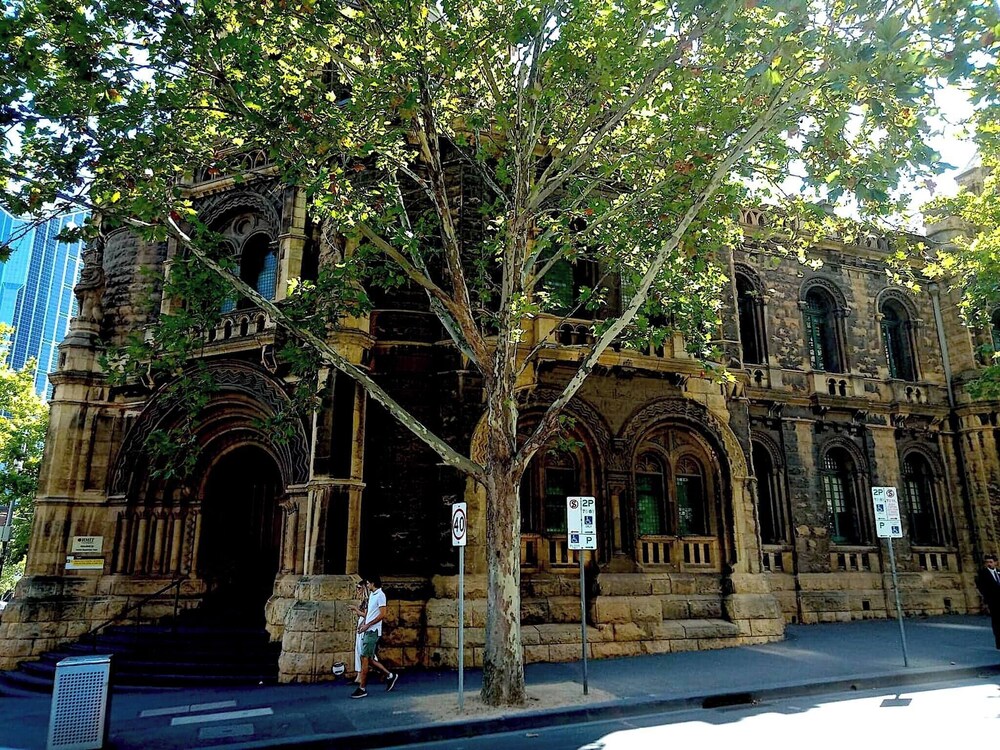 Unwind in Style at Melbourne's Historic Art Deco Apartment With Pool Gym Carpark