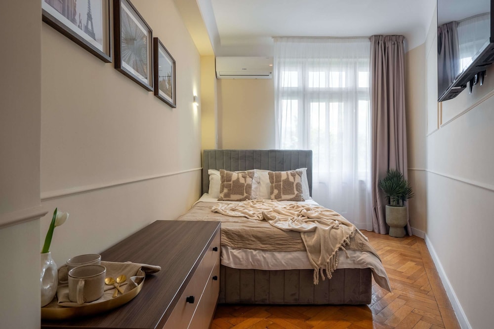 Elegant 3BR Flat Steps From Romanian Athenaeum