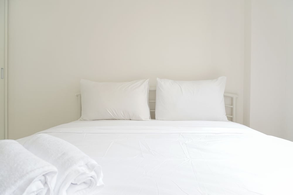 Minimalist and Restful 2BR at Podomoro Golf View Apartment
