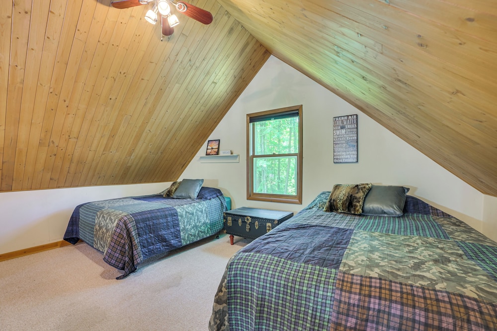 Dock Access + Nearby Beach: Higgins Lake Retreat!