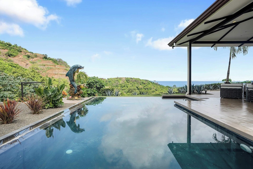 Luxe Tropical Villa with Sparkling Infinity Pool, Panoramic Ocean Views & Community Amenities
