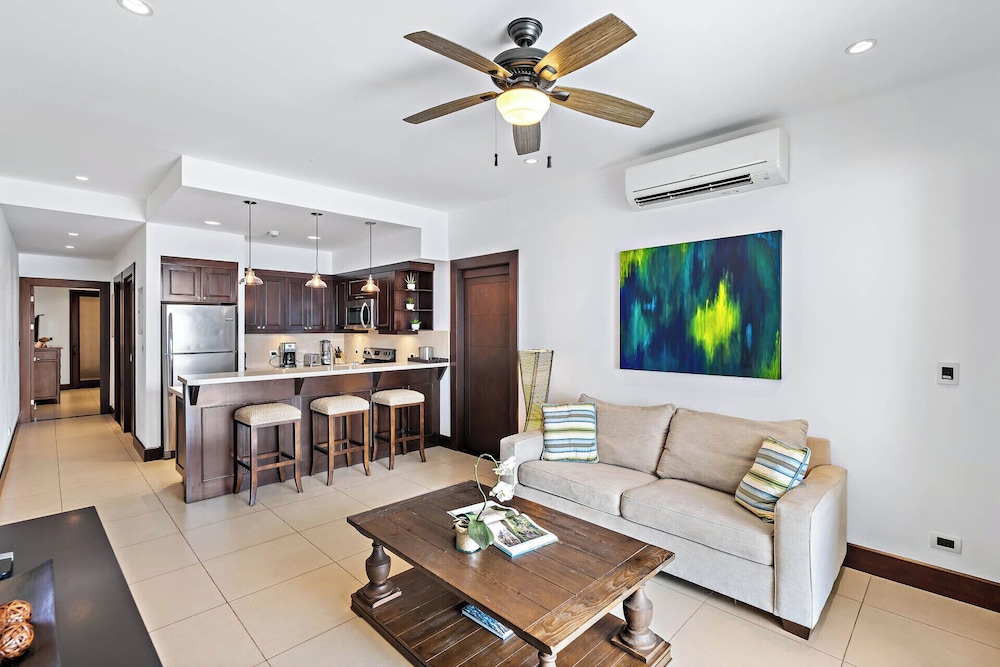 Luxury Condo with Panoramic Ocean Views, Sparkling Infinity Pool, and Modern Open-Concept Design