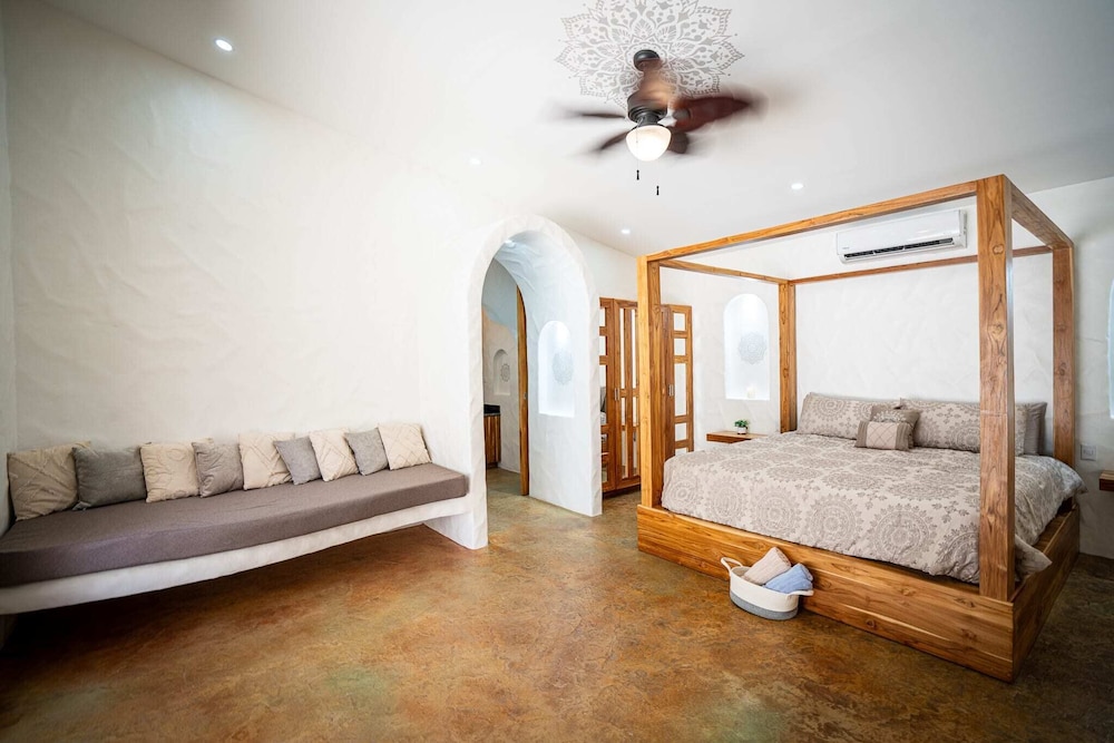 Bohemian Tropical Villa with a Tiki-Style Swimming Pool & Swim-Up Bar with an Attached Studio Apartment