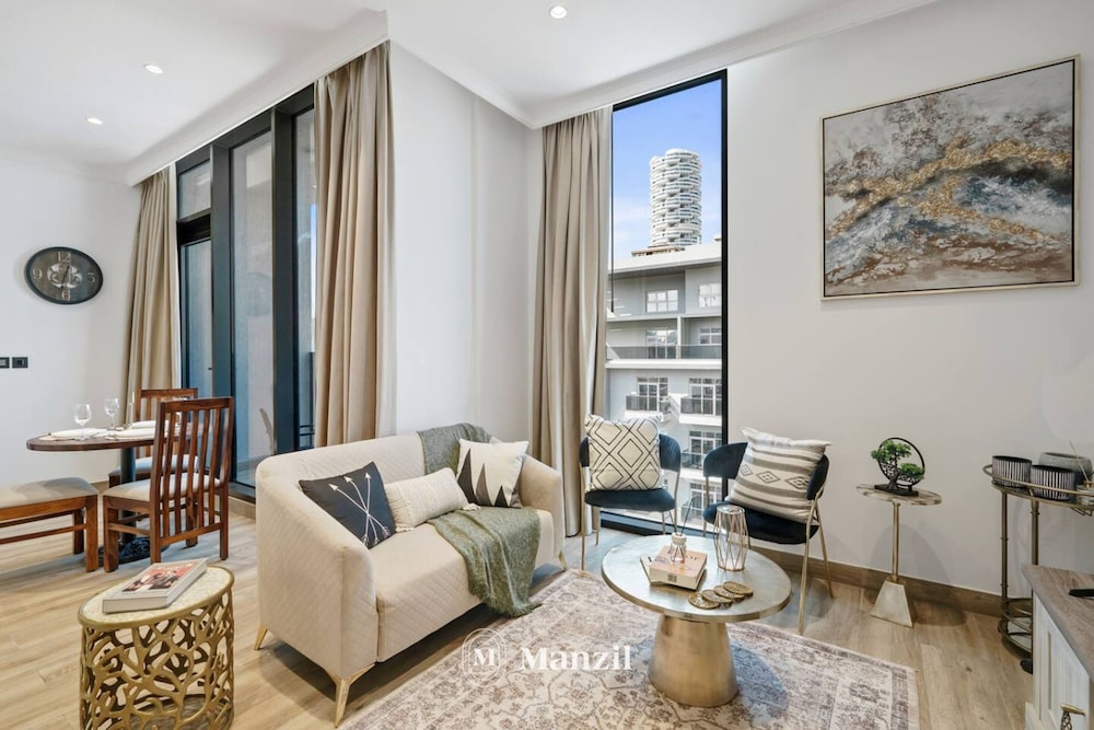 Stylish 1BR Apt w Pool in JVC nr Dubai Sports City