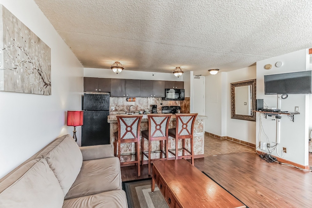Waikiki Banyan Condo Located One Block From Waikiki Beach! by Koko Resort Vacation Rentals