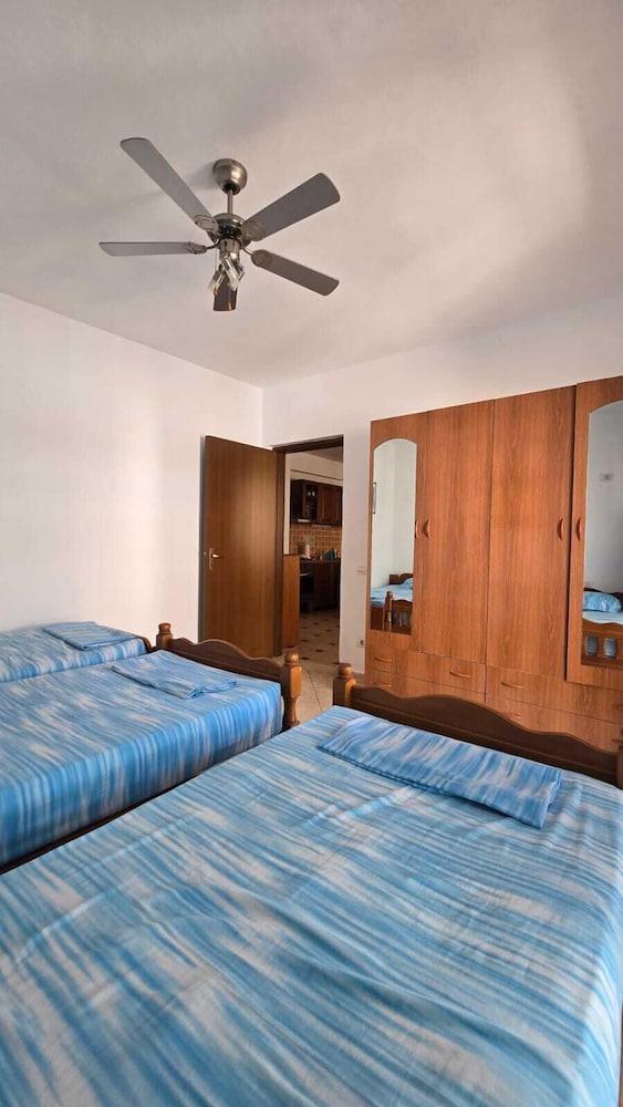 Tirent Apartment - Cozy Bedrooms Stay by Golem Beach.