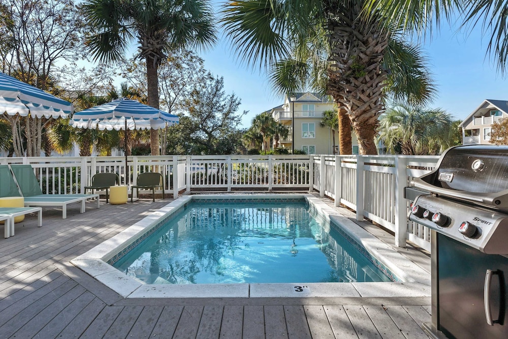 Steps to Beach! Arcade Game Room, Pool + Hot Tub Calico Scallop by Avantstay