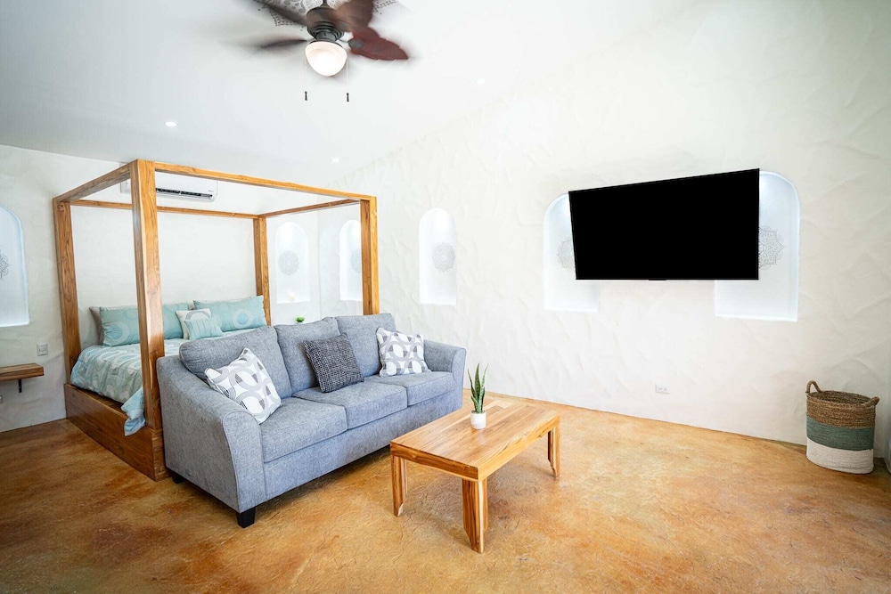 Bohemian Tropical Villa with a Tiki-Style Swimming Pool & Swim-Up Bar with an Attached Studio Apartment