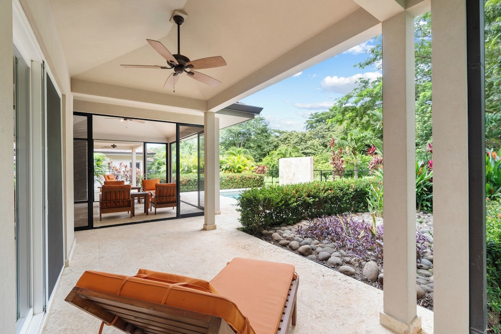 Beautiful home in a gated Neighborhood, Walking Distance to Beach with Garden