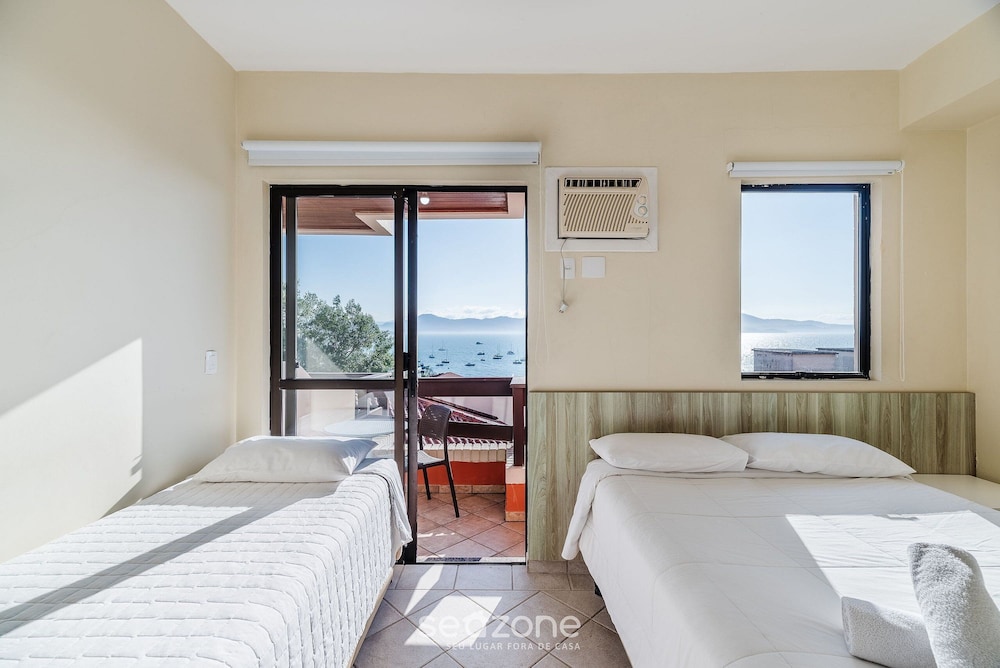 JOFs Apartamentos c Piscina e Vista Mar
