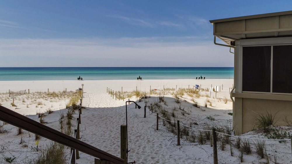 Beachfront Charm Meets Lake Life + Free Tickets: Dolphin Cruise & More!