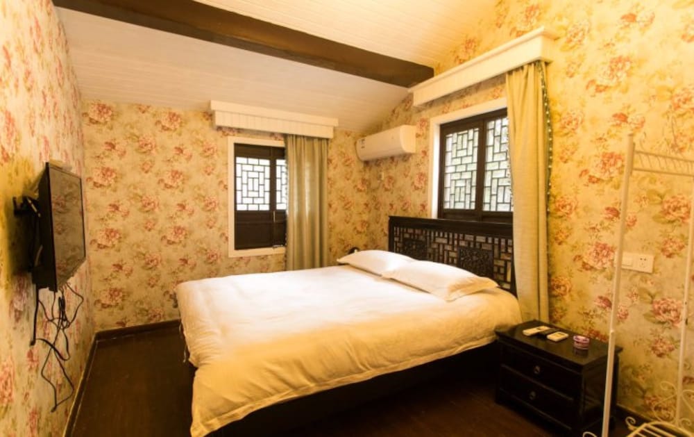 Zunyuelou Inn Tongli
