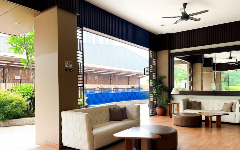 Basic Studio Room At Azalea Suites Apartment