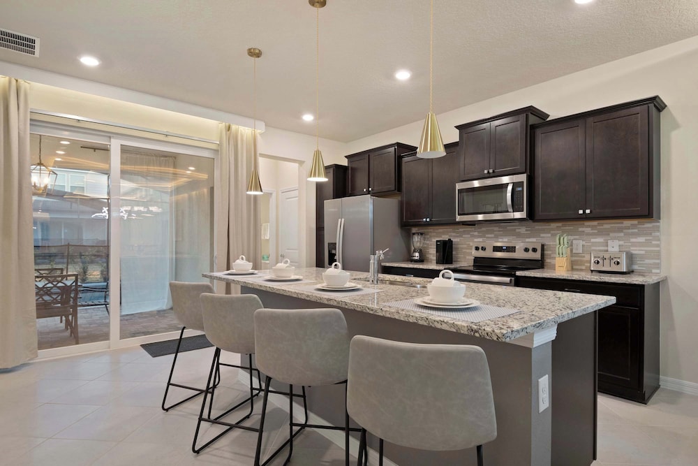 Luxurious Windsor Cay Villa Private Pool, Epic Game Room & Minutes to Disney!