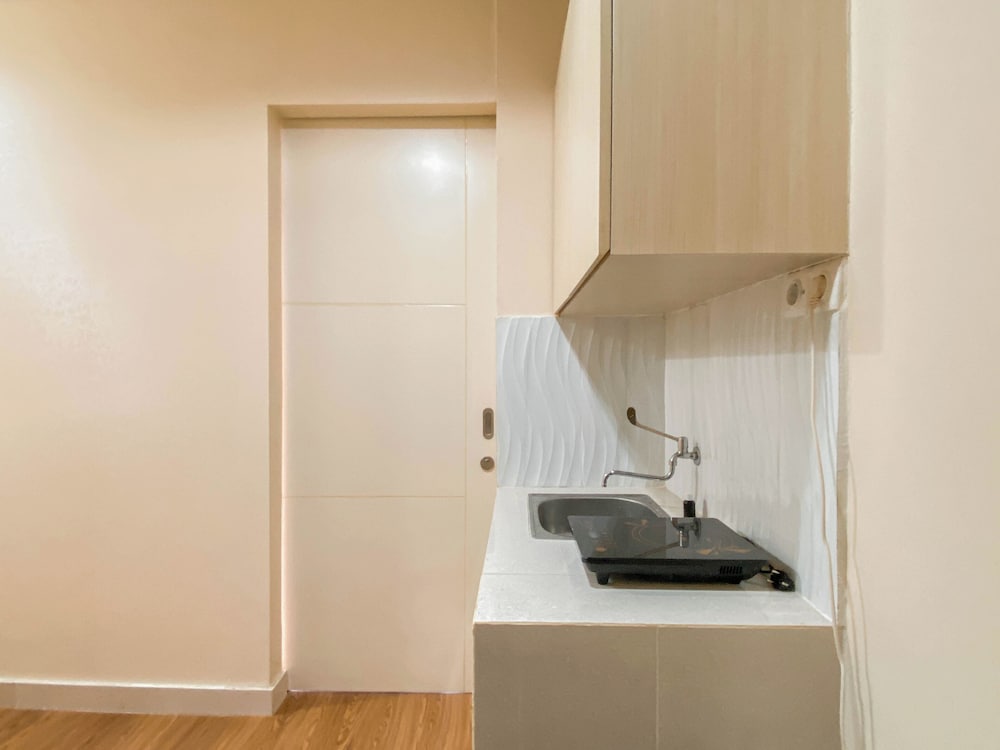 Warm and Cozy 1BR without Living Room at Sentul Tower Apartment