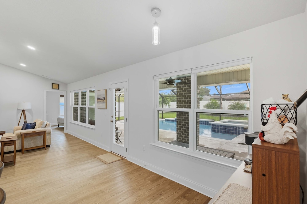 Modern 4BR Retreat Near Beach Heated Pool