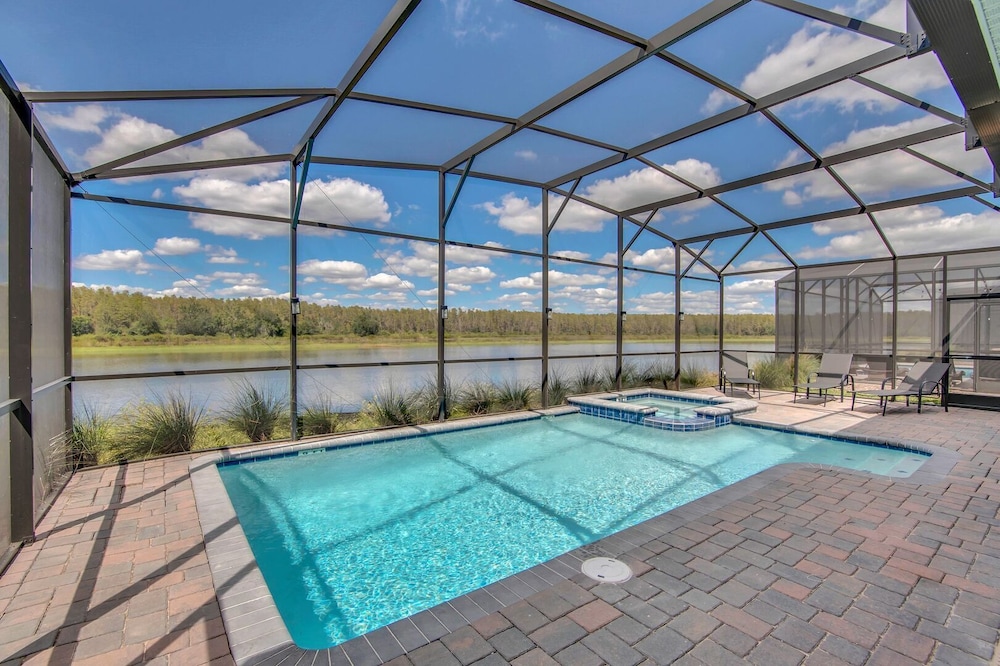 Serenity Lakeview Retreat Stunning Water Views, No Rear Neighbors, Private Pool, Game Room & Star Wars Cinema