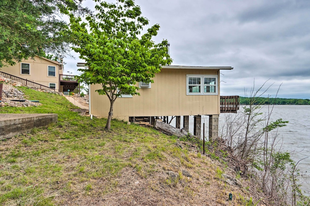 Lakefront Ozark Cottage: Deck w/ Covered Dock! view 5
