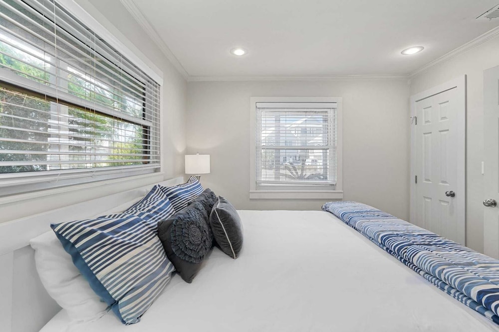 Beach Retreat w/ Sundeck, Golf Cart & Bikes Bungalow House by Avantstay