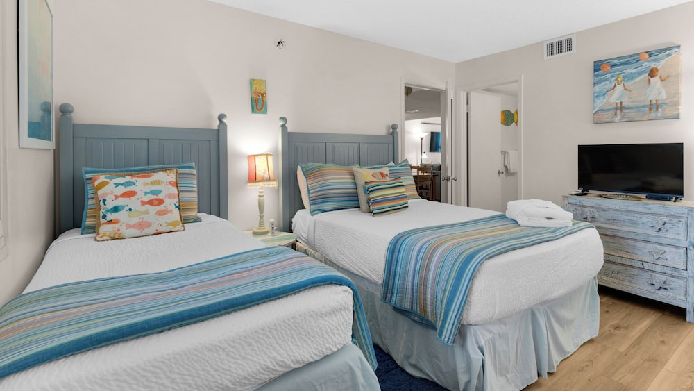 Beachfront Charm Meets Lake Life + Free Tickets: Dolphin Cruise & More!