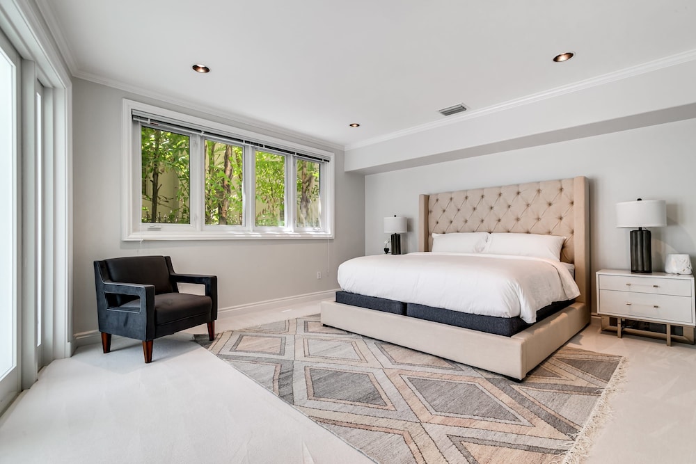 Waterfront Mansion With Game Room Gym Media Room and Guest House