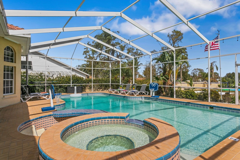 Waterfront Pool Pickleball Court Game Room