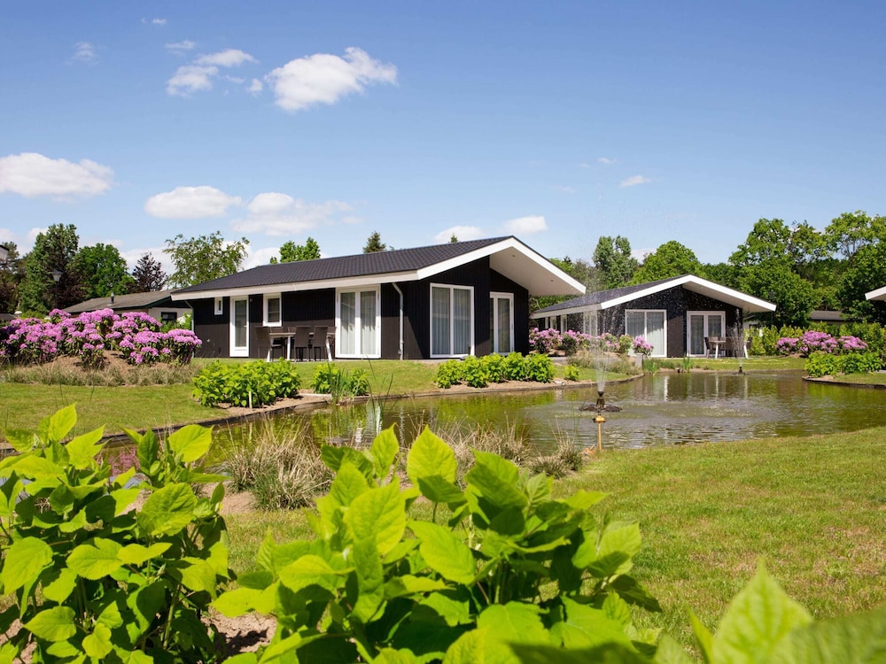 Chalet in Netherlands by Scenic Pond view 2