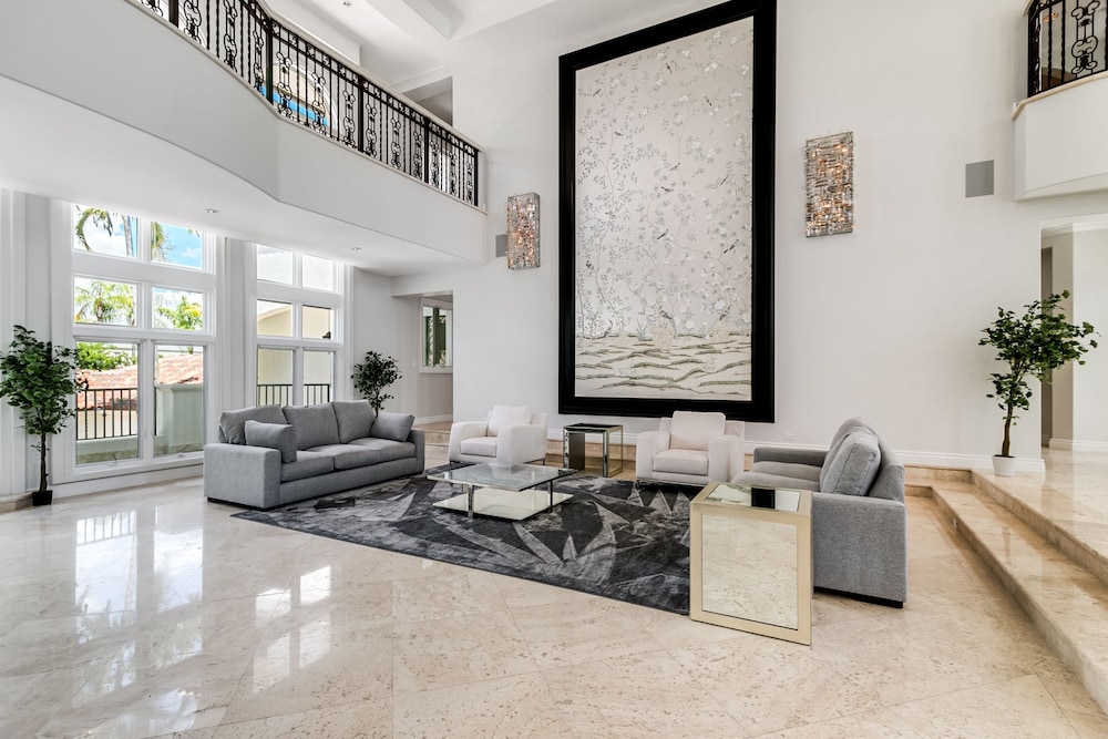 Waterfront Mansion With Game Room Gym Media Room and Guest House