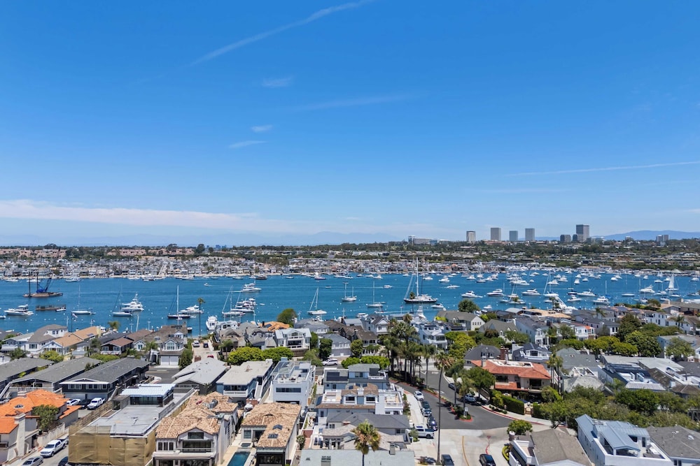 Oceanfront Home Walk to Balboa Pier + Scenic Views Balboa Peninsula Point by Avantstay