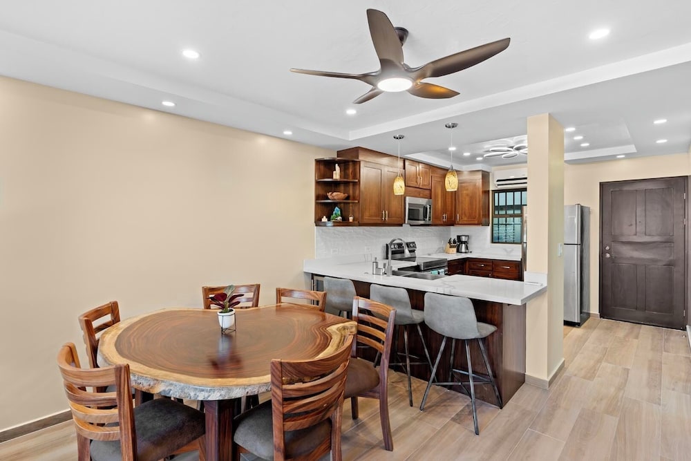 Stylish 2-Bedroom Beach Condo with Ocean-View Deck, Lush Pool Area & 2-Minute Walk to Flamingo Beach
