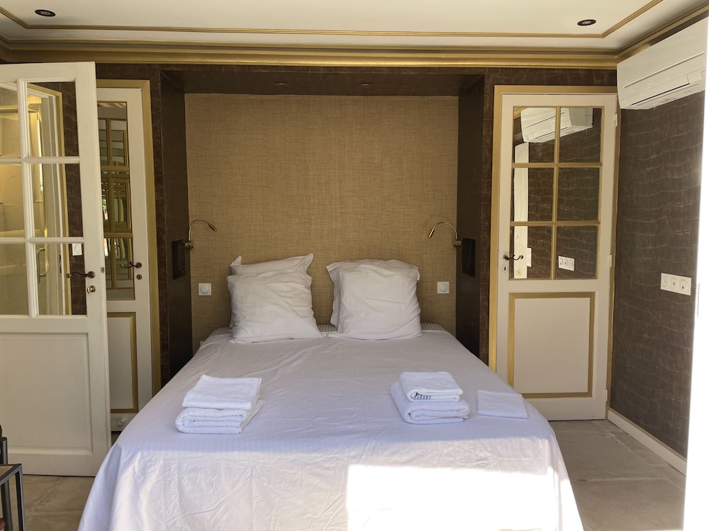 Chambre Luxe Piscine Jardin vue Solarium Palmeraie