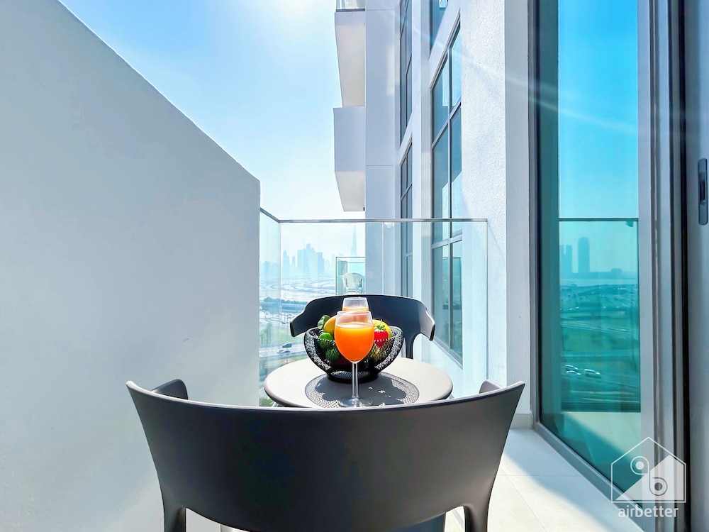 Cozy 1BR With Balcony & Views in Azizi Fawad