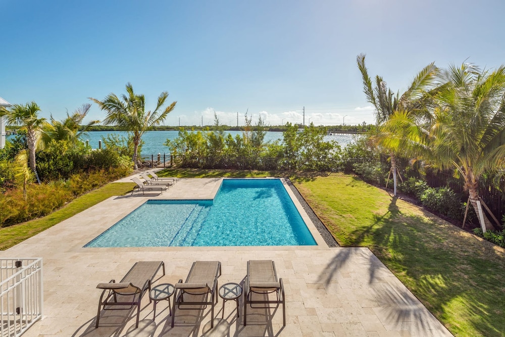 Suncoast House by Brightwild Pool Boat Dock view 5