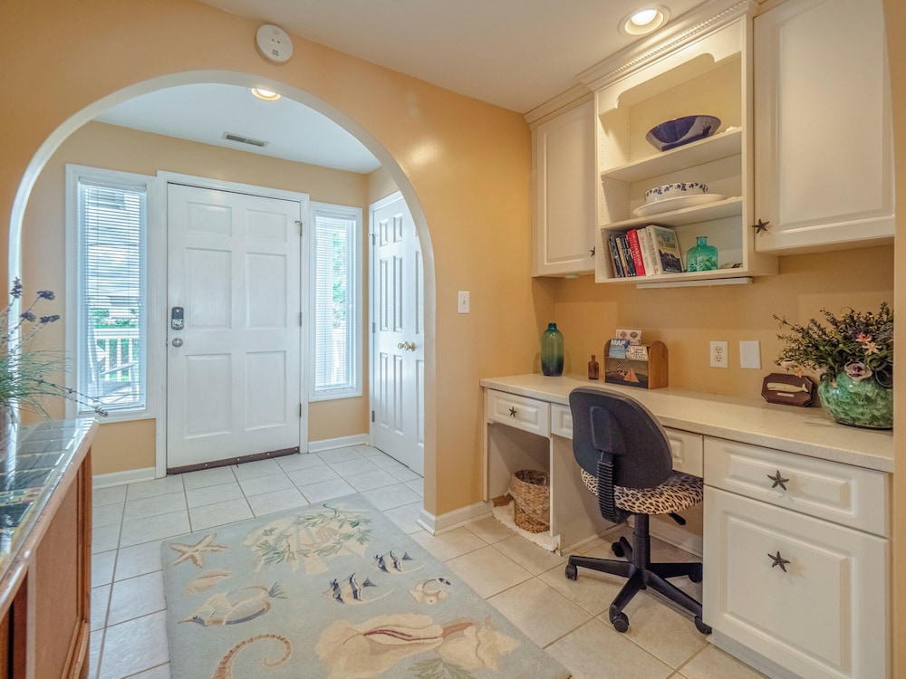 A Charm of Finches by Topsail Realty