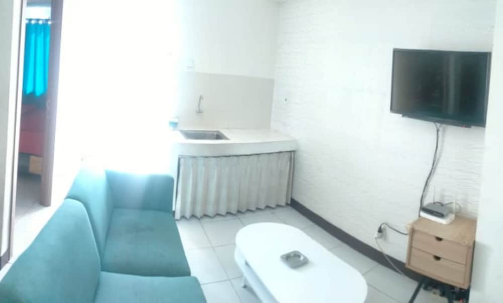 Cinere Resort Apartment By Celebrity Room view 4