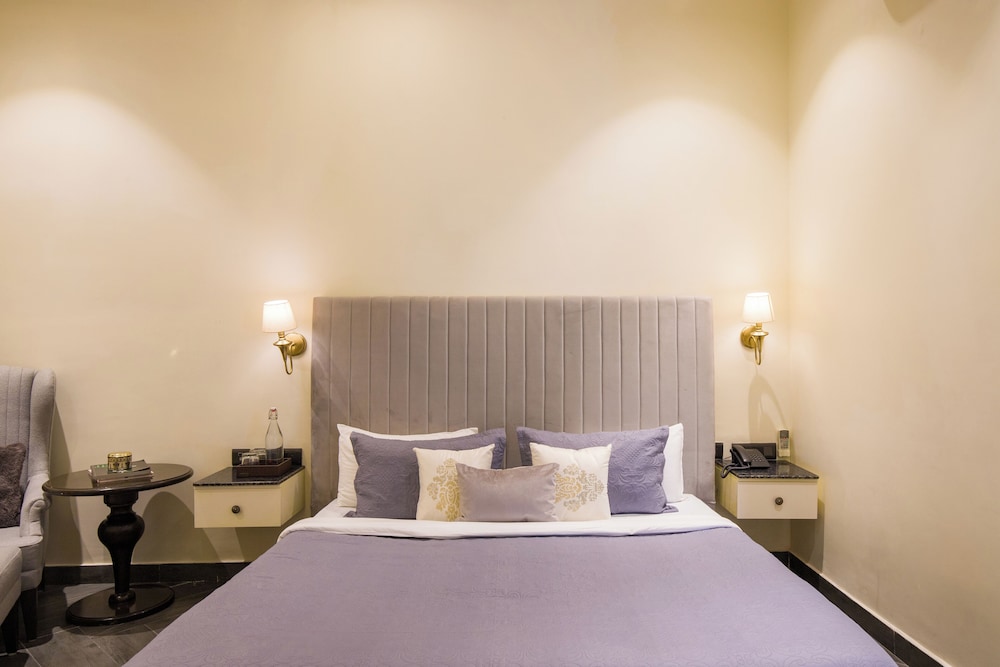 ELIVAAS Ibiza Luxe 4-BHK Farmhouse