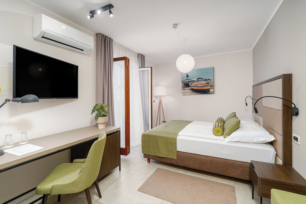 Al Porto Suites